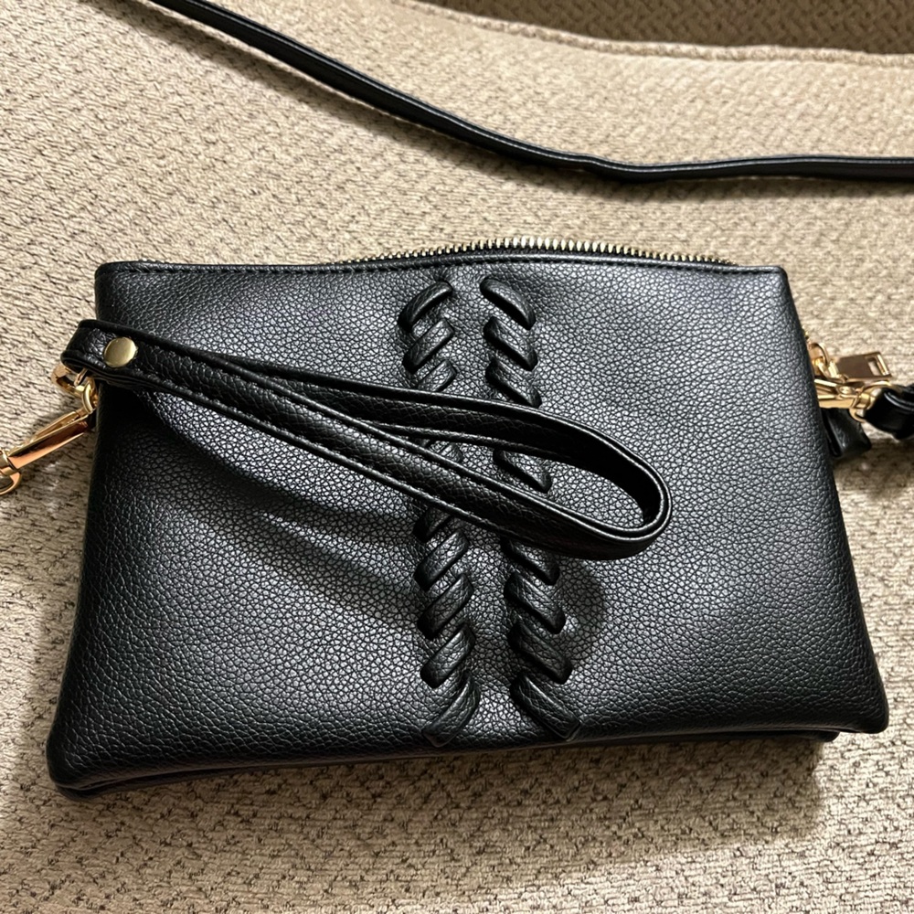 Black wristlet/shoulder bag. Approximately 8 x 5. EUC.